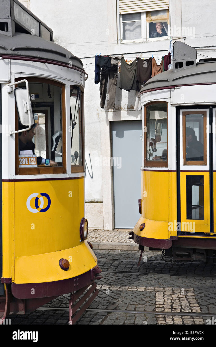 Tram Electrico tourist trams in Alfama district of Lisbon city Portugal Stock Photo