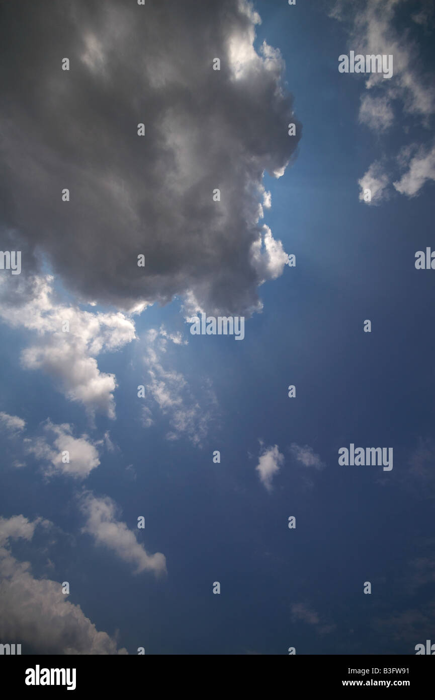 Bright blue summer sky with large fluffy clouds Stock Photo - Alamy