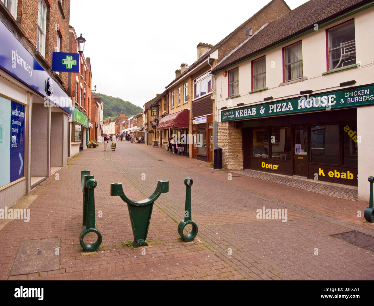 Quiet pedestrian precinct with relics of former engineering industry in ...