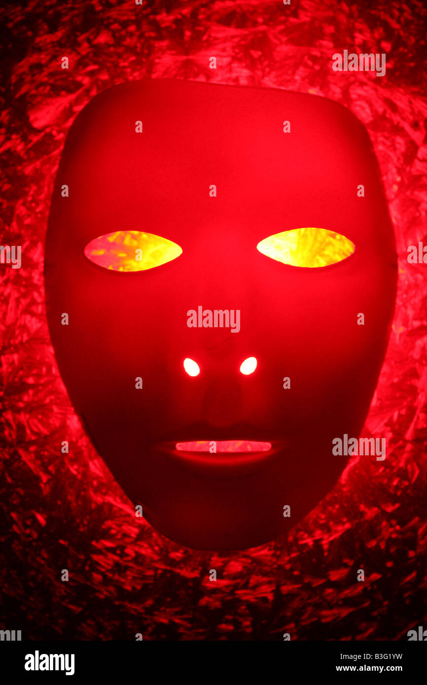 Download A Scary Mask Face W Glowing Yellow Eyes Stock Photo Alamy PSD Mockup Templates