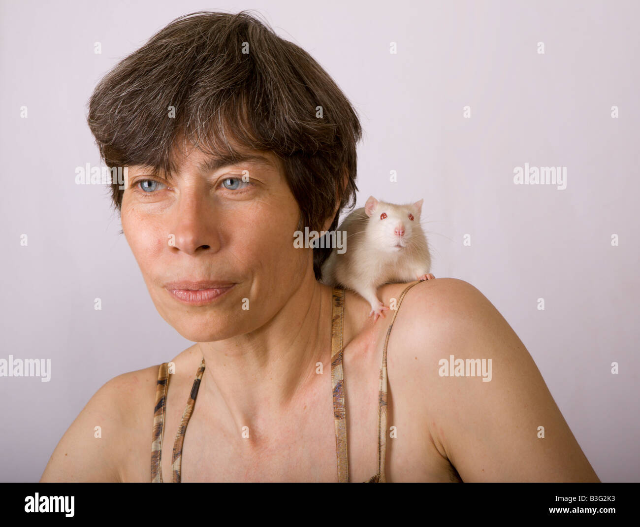 Portrait of the woman with a white rat Stock Photo