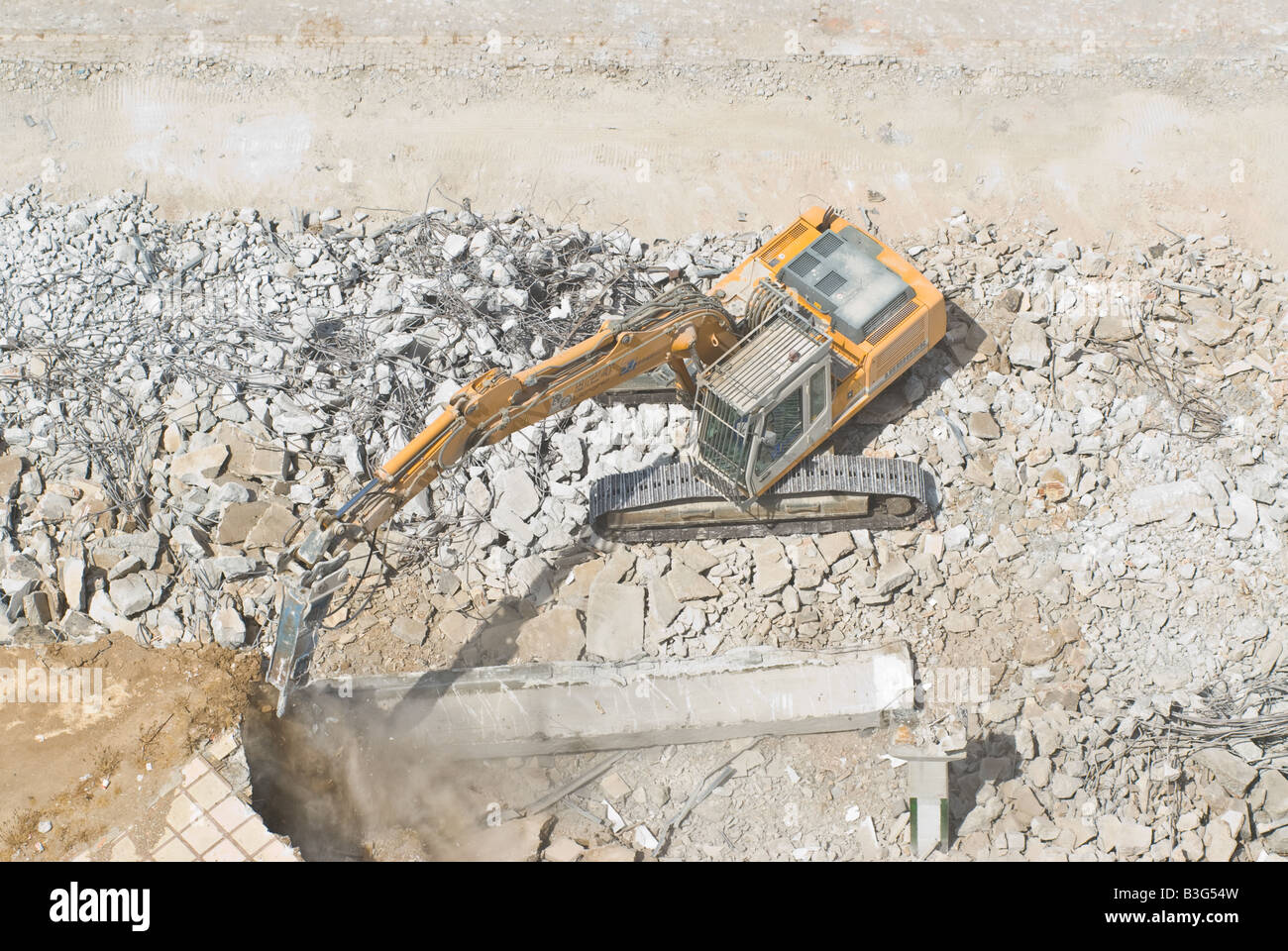 crawler excavator with jackhammer attachment on demolition job Stock Photo Alamy