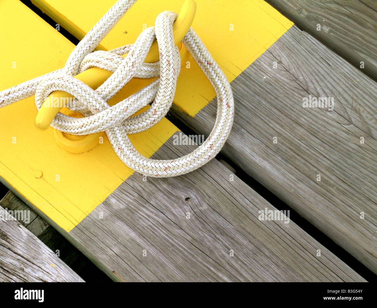 Marina dock lines tied on cleat Stock Photo Alamy