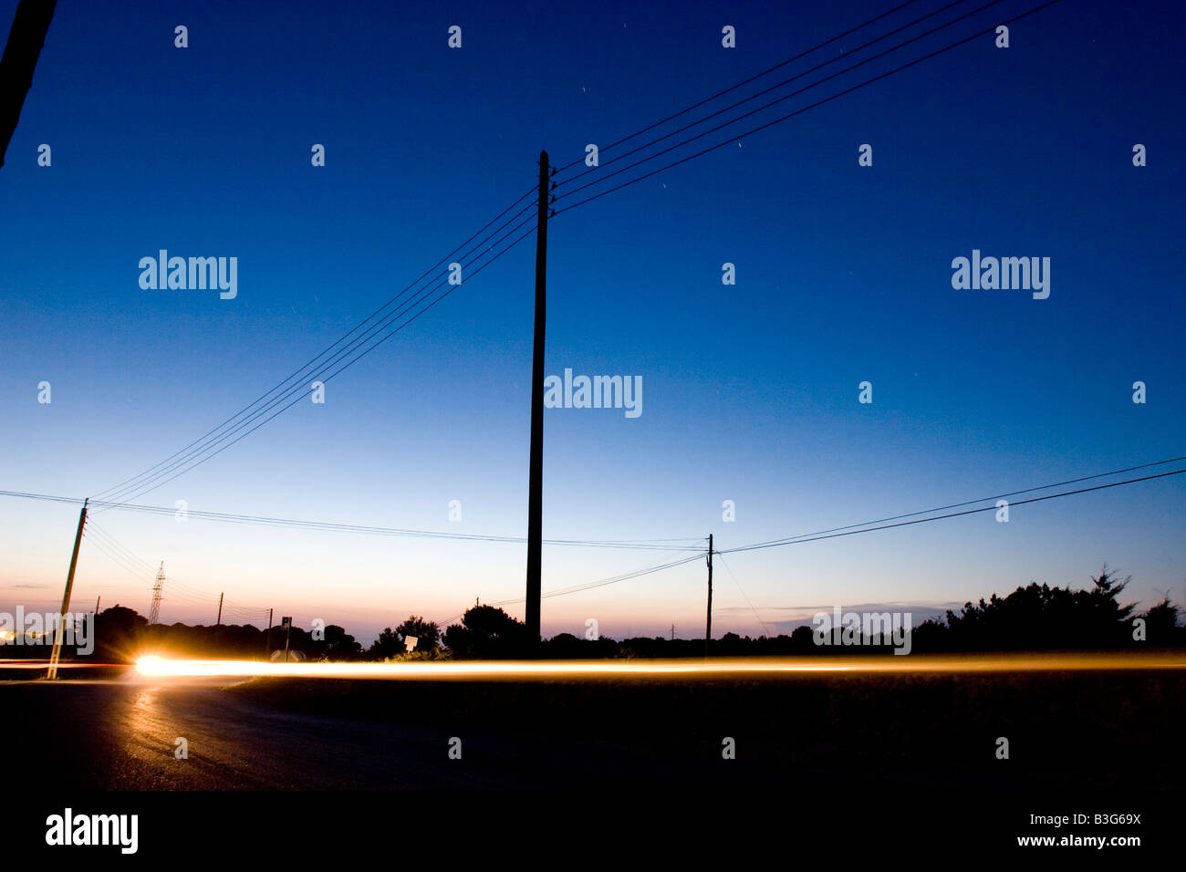 Motorbike's ray of light at sunset, Formentera, Balearic Islands. Spain Stock Photo