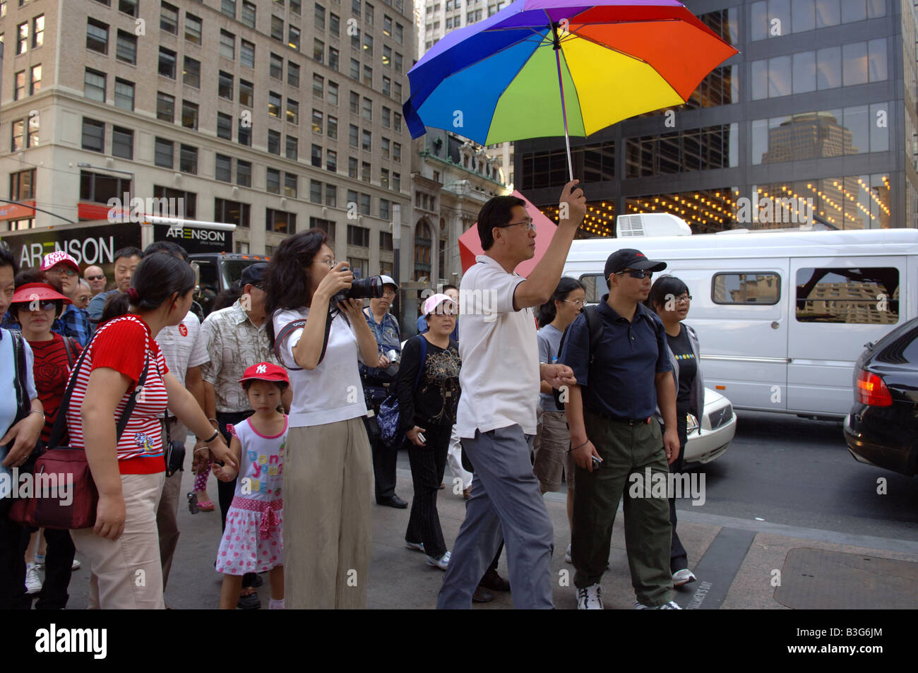 Chinese tourists stroll the streets of lower Manhattan in New York on Thursday August 21 2008 Frances M Roberts Stock Photo