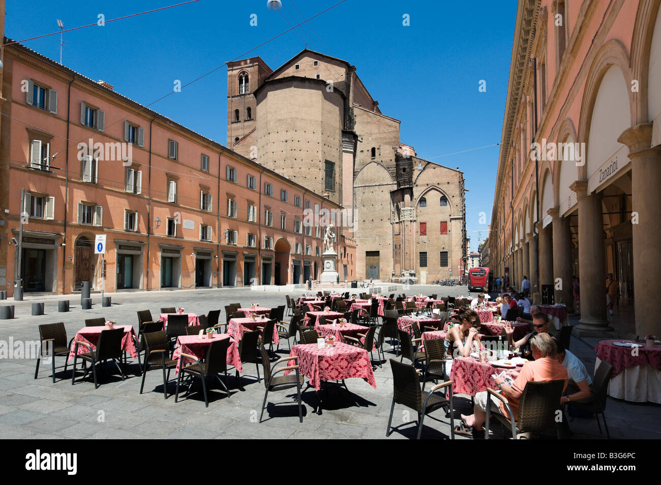 Restaurant on Piazza Galvani in the historic centre with the church of San Petronio behind, Bologna, Emilia Romagna, Italy Stock Photo