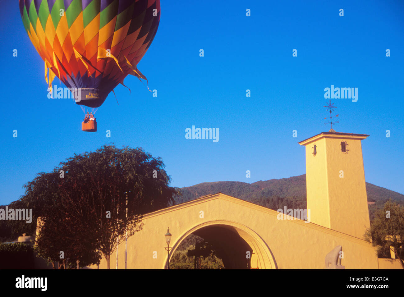hot air balloon and the Robert Mondavi Winery Napa Valley California Stock Photo