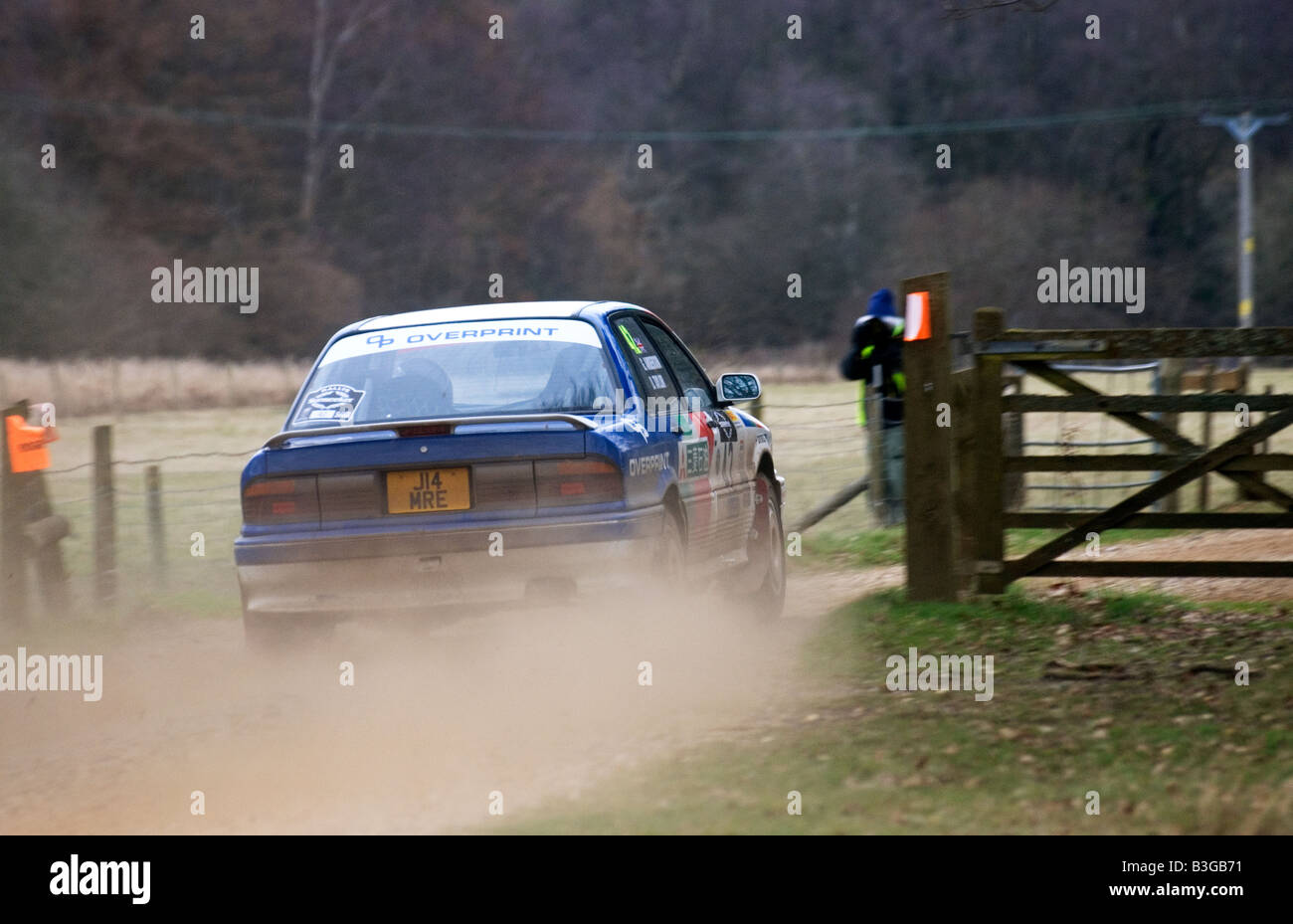 Mitsubishi Ralliart Galant rally car going over a cattle grid at speed Stock Photo