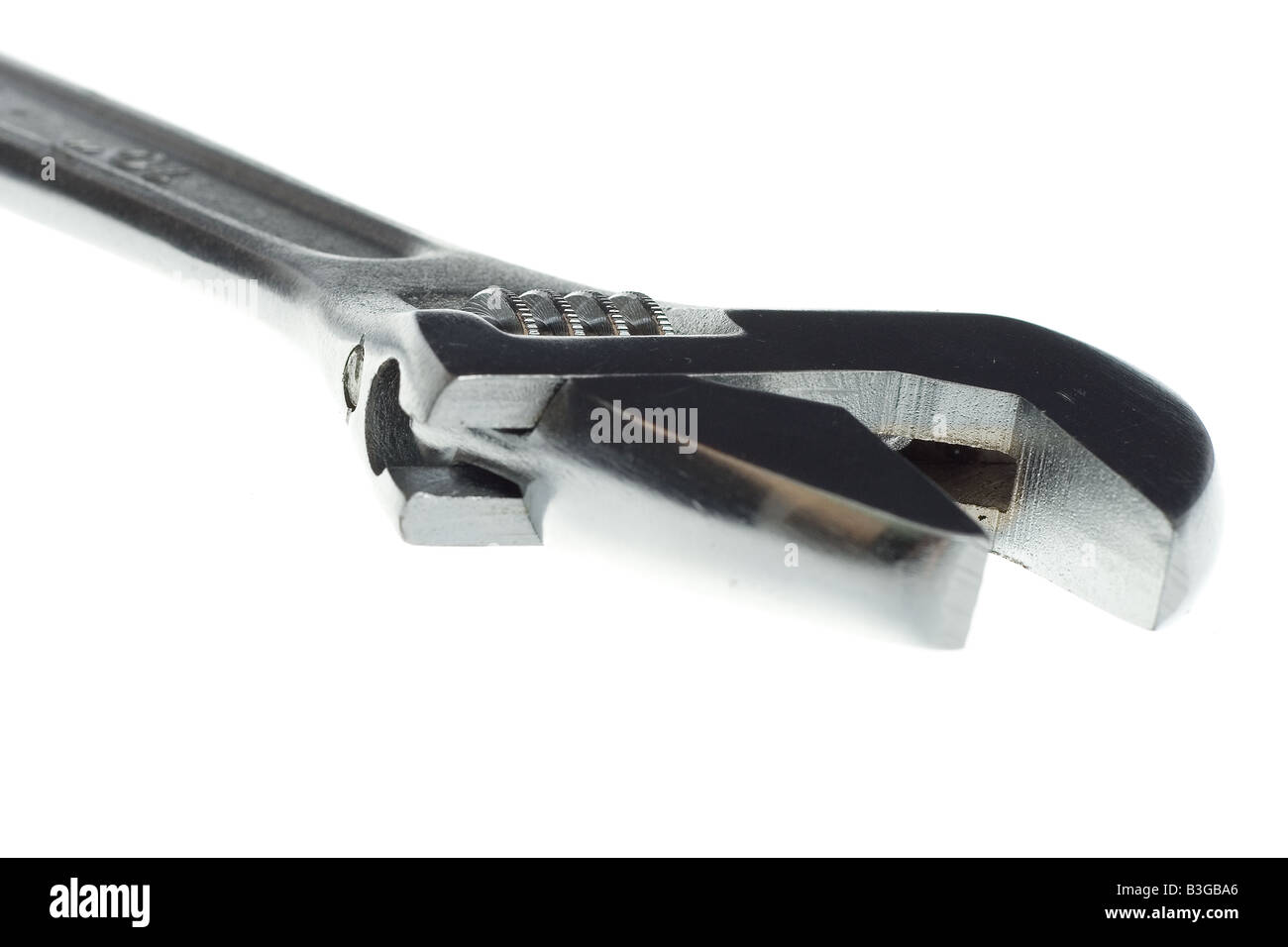 Closeup of adjustable screw wrench over white background Stock Photo