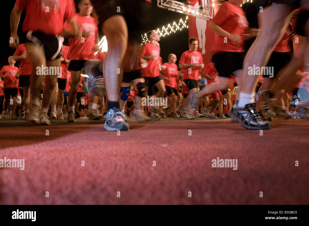 Runners at kick off point in Eben Gvirol street during Nike Human Race  event in Tel Aviv Israel Stock Photo - Alamy