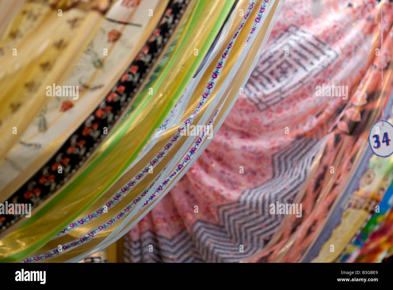 Brightly coloured material for sale Stock Photo Alamy