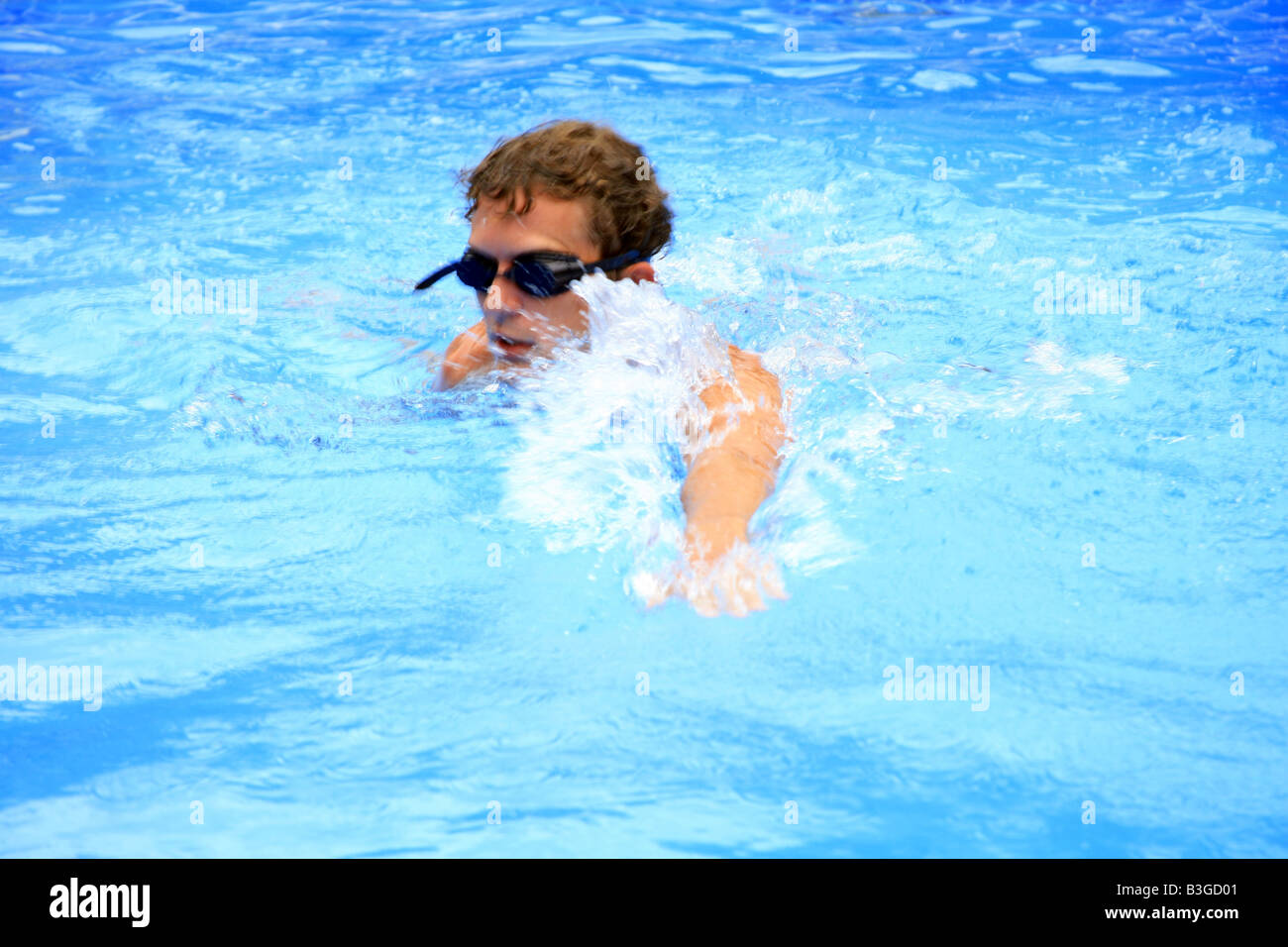 Action shot of Man swimming towards the camera Stock Photo