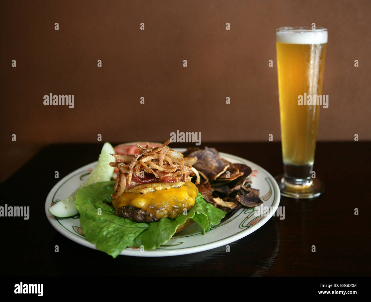 A gourmet burger and a draft beer Stock Photo