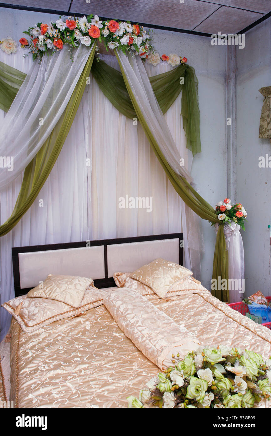 Decorated bed for the newly wed in Malaysia. Stock Photo