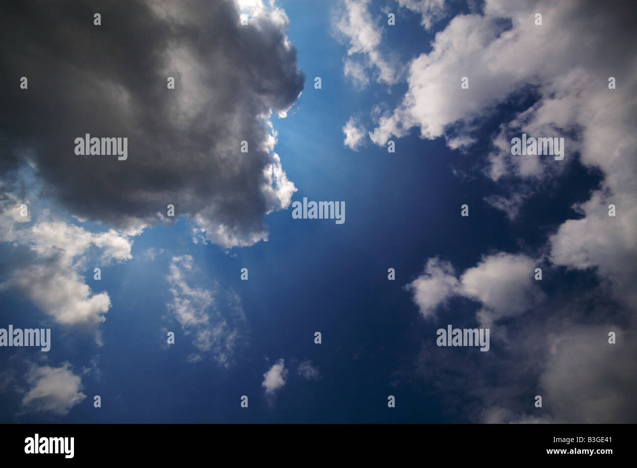 Bright blue summer sky with large fluffy clouds Stock Photo - Alamy