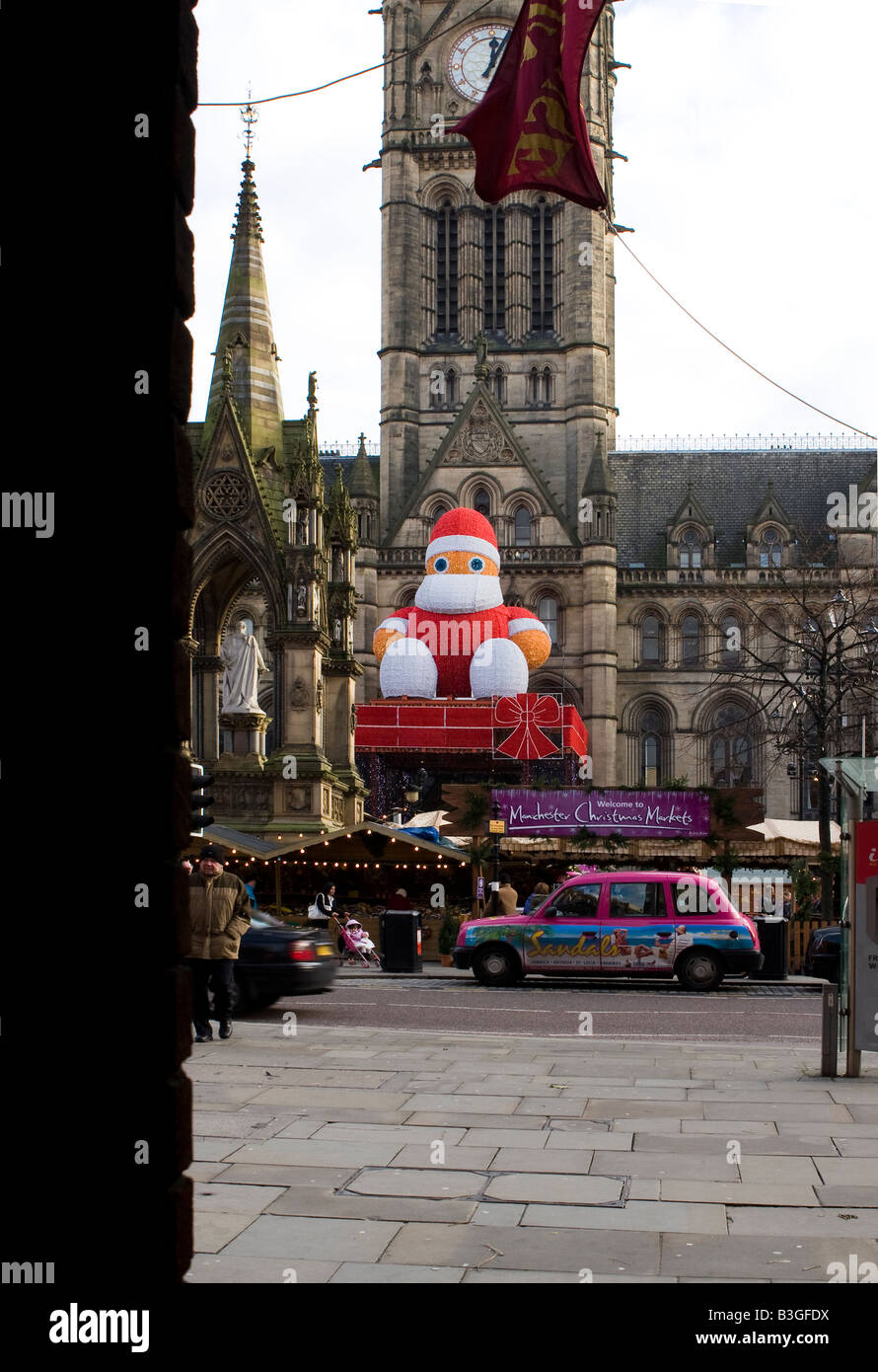 Father Christmas Xmas Santa Albert Square Manchester Town Hall continental Market very quiet few people recession Stock Photo