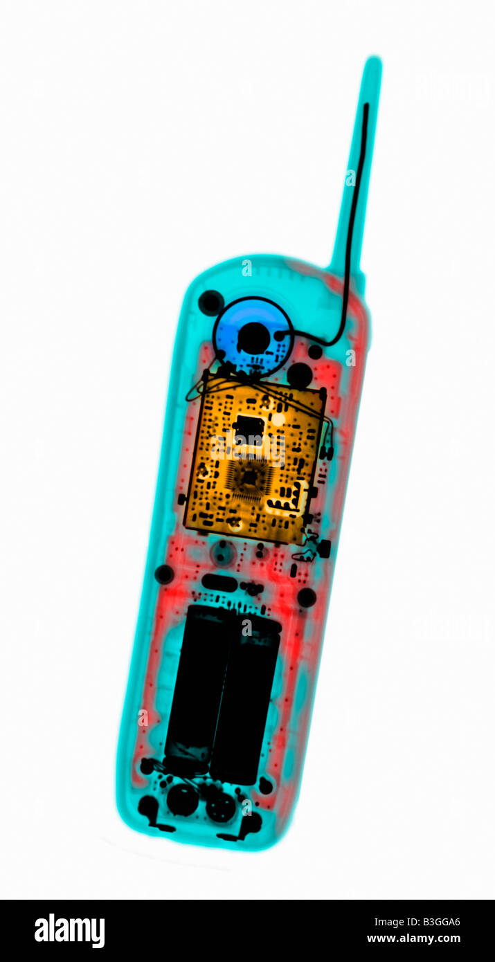 colorized x ray of a cell phone showing the internal electronic ...