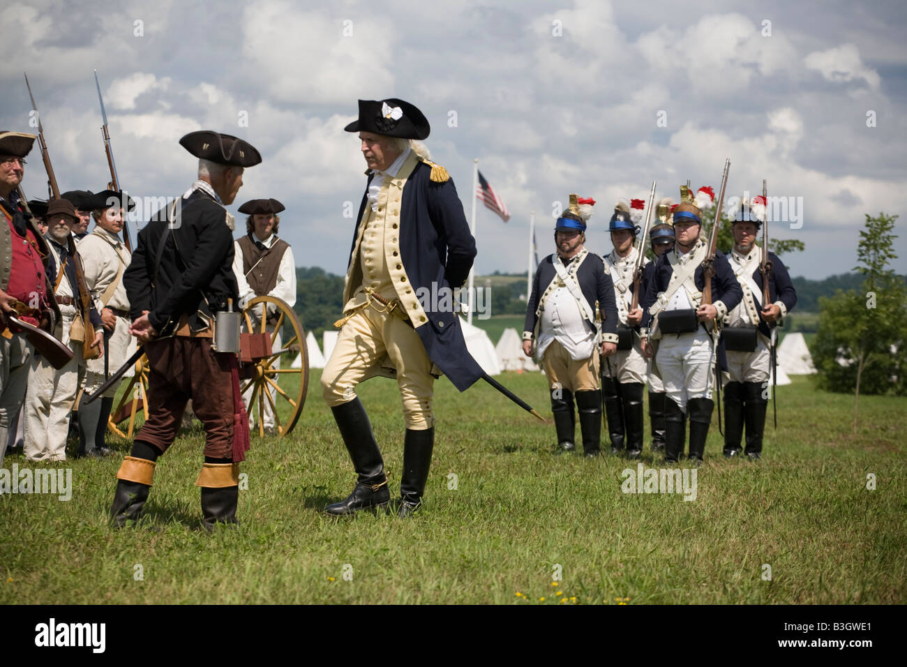 George Washington impersonator Dean Malissa inspecting troops at Revolutionary War reenactment Mohawk Valley New York State Stock Photo