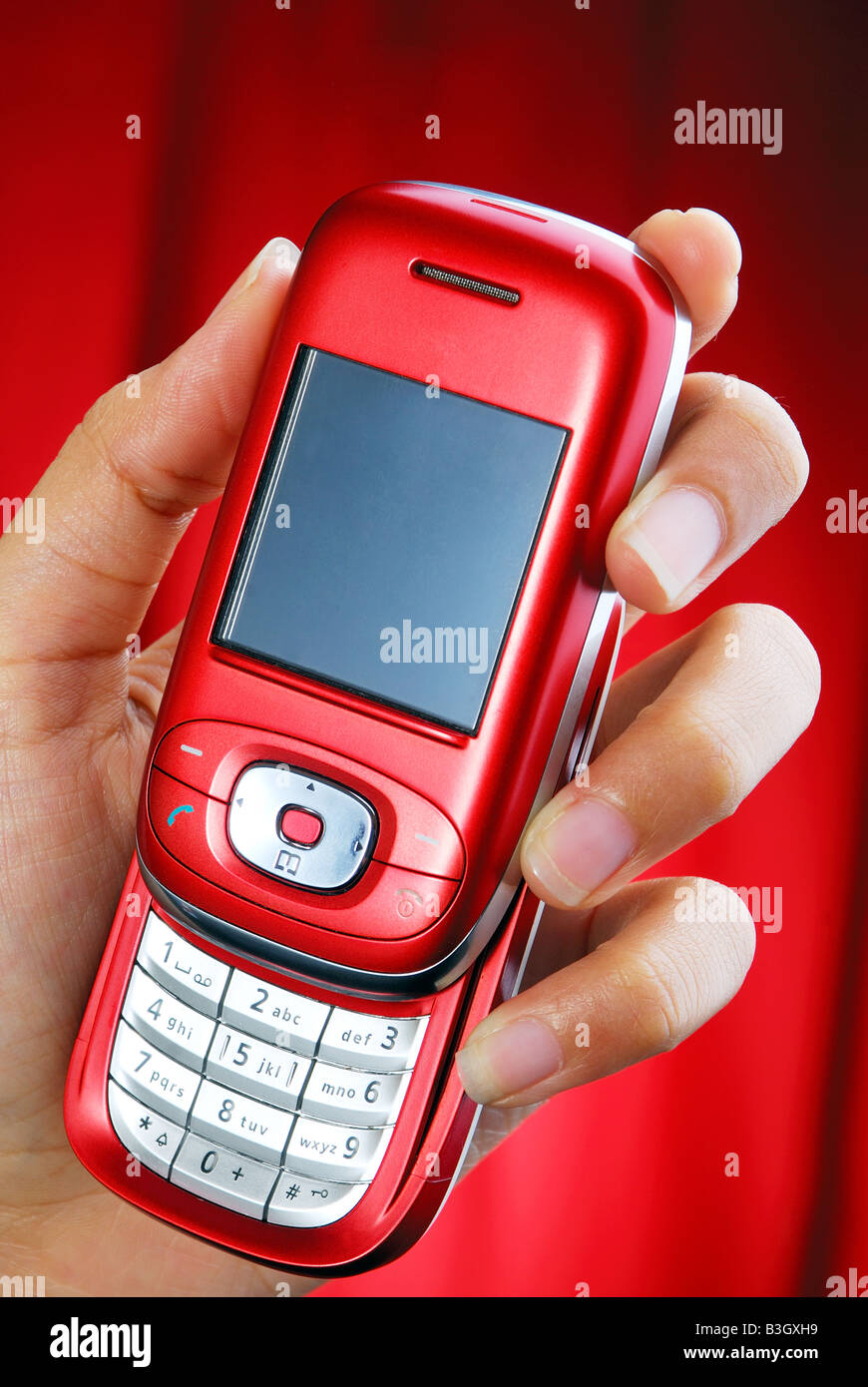 Handphonp Hand flip phone hi-res stock photography and images - Alamy