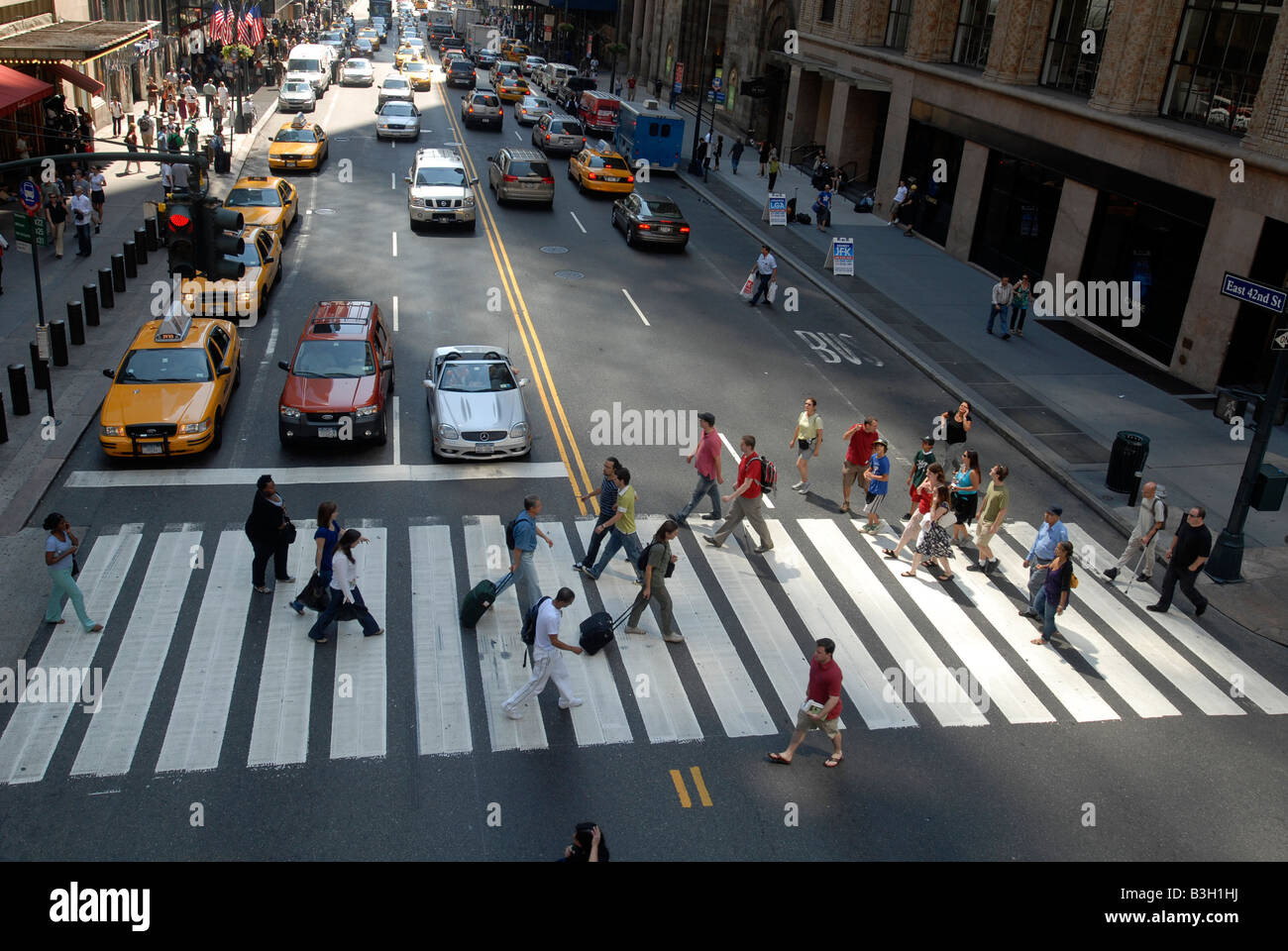 Pedestrians cross East 42nd Street opposite Grand Central Terminal on Saturday August 16 2008 Richard B Levine Stock Photo