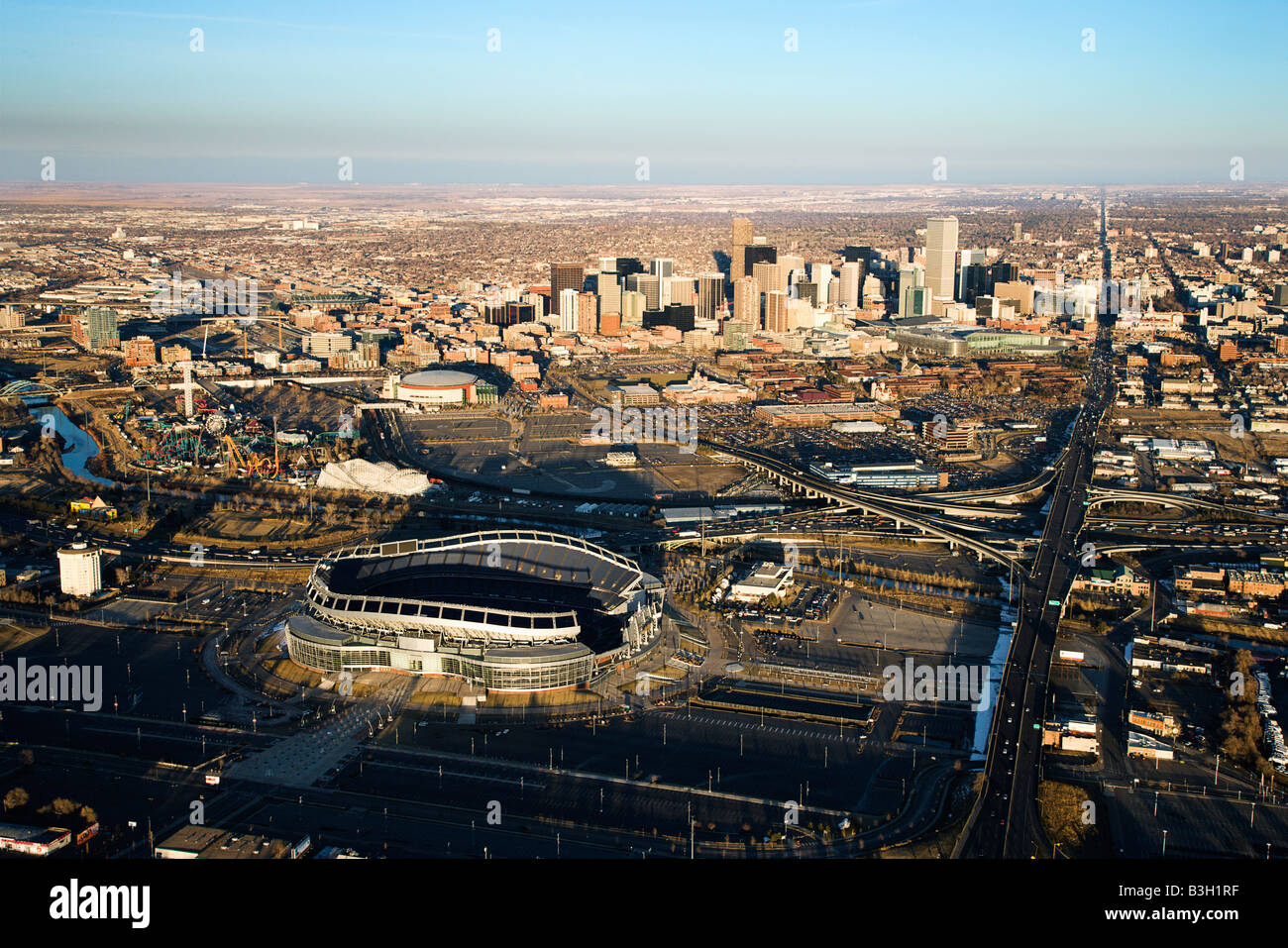 Aerial cityscape of urban Denver Colorado with Mile High stadium in foreground Stock Photo
