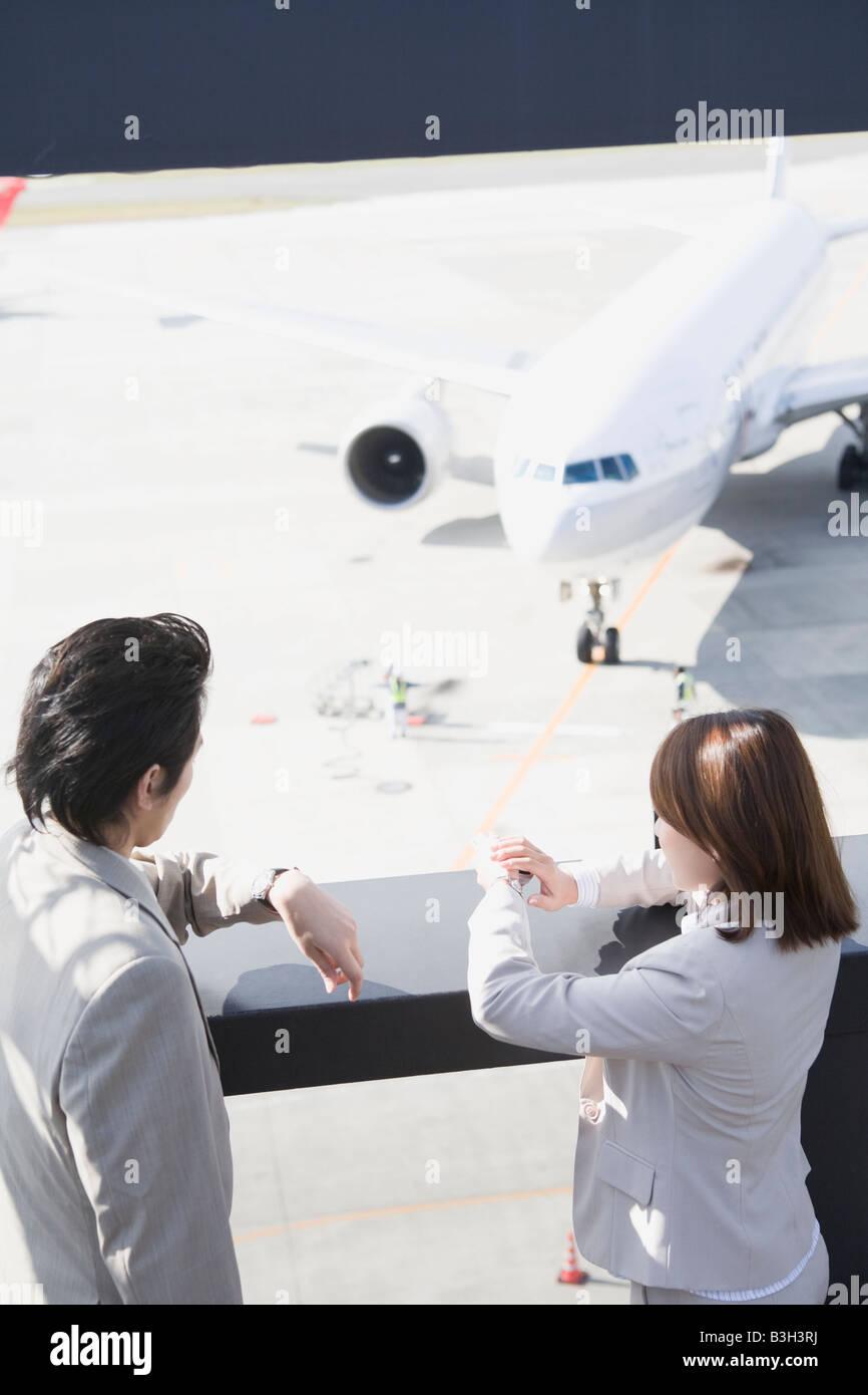 Airport woman black hi-res stock photography and images - Alamy