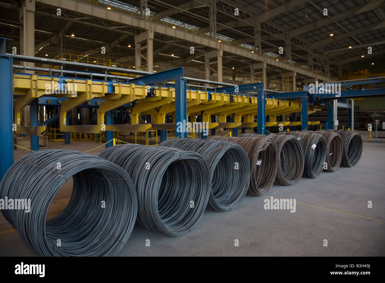 Rolls of Steel rebar wire stacked at steel factory in Abu Dhabi UAE United Arab Emirates Arabian