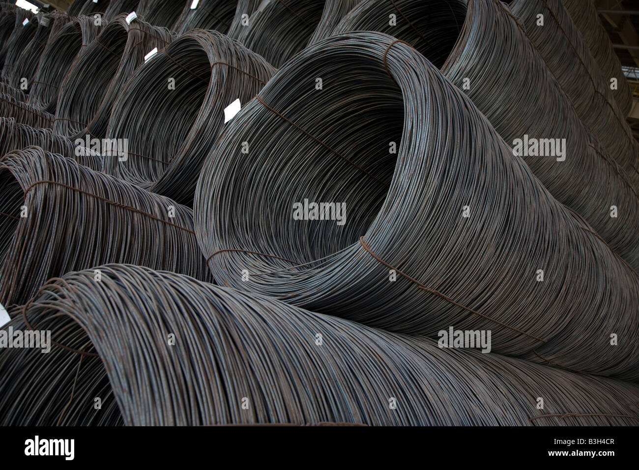 Rolls of Steel rebar wire stacked at steel factory in Abu Dhabi UAE United Arab Emirates Arabian