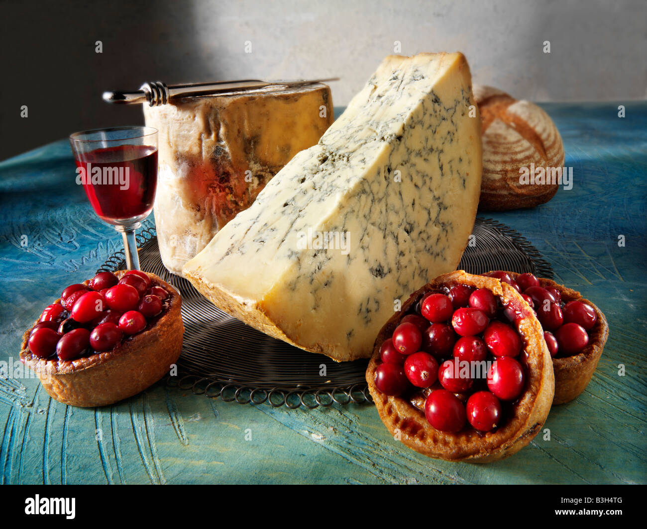 Whole Organic stilton with Cranberry topped pork pies. Christmas food Stock Photo