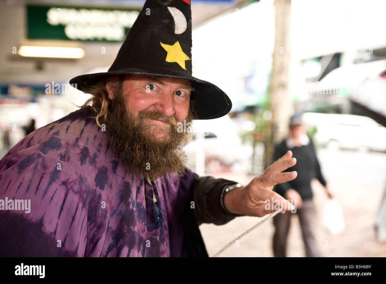 A happy wizard doing tricks on the streets of Nelson new Zealand Stock