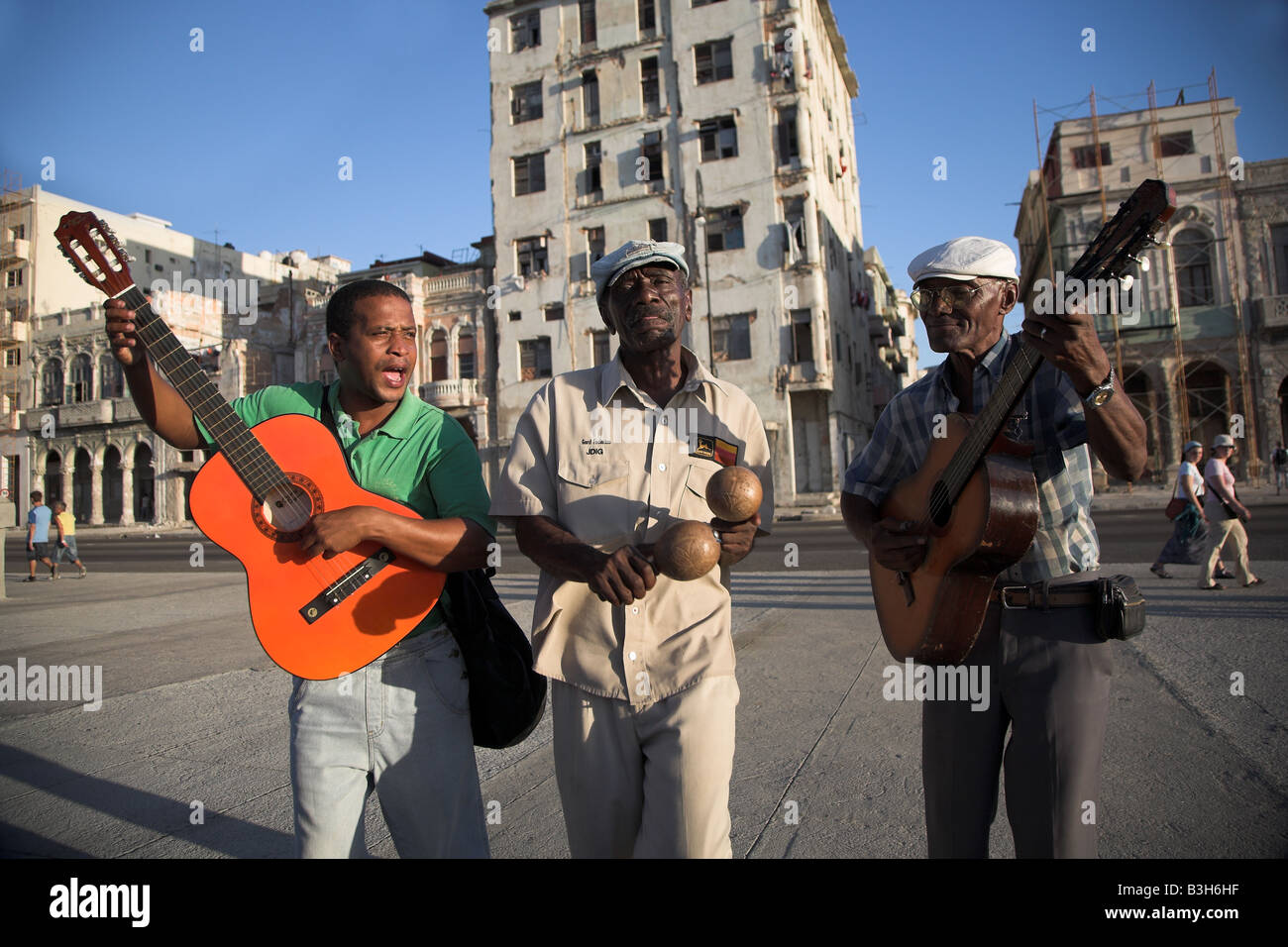 Local musicians play on the Malecon in Havana, Cuba Stock Photo