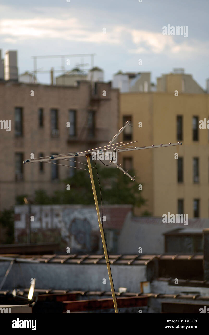 Television antennas on the roof of buildings in the borough of Queens in New York Stock Photo