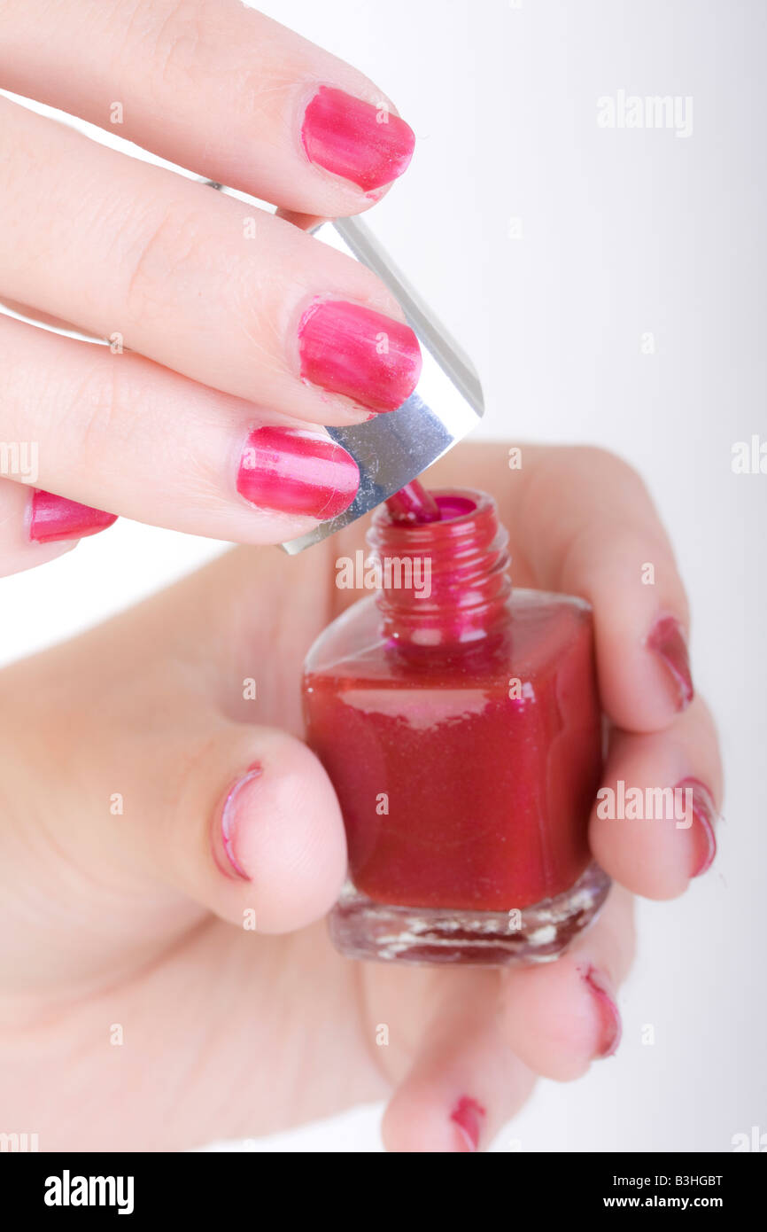 painting fingernails with nail polish Stock Photo Alamy