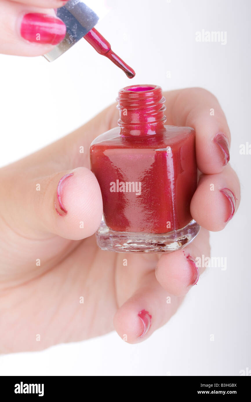painting fingernails with nail polish Stock Photo - Alamy