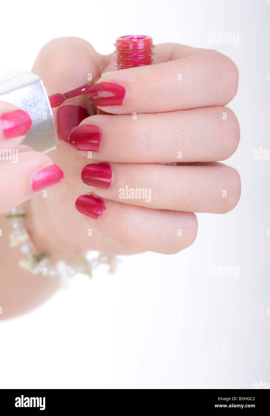 painting fingernails with nail polish Stock Photo - Alamy