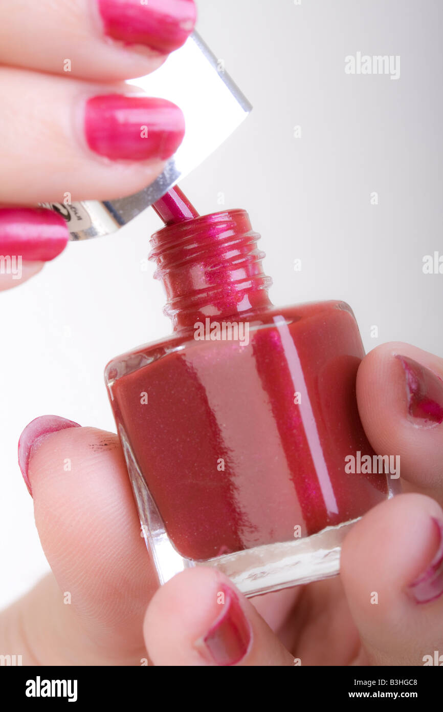 painting fingernails with nail polish Stock Photo Alamy