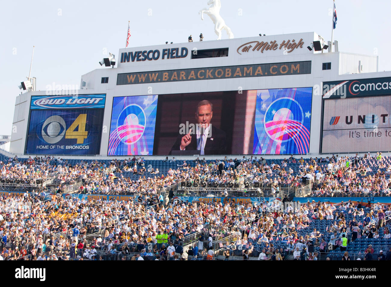Howard Dean's speech is shown over the large screen at Invesco Field Denver Co Stock Photo