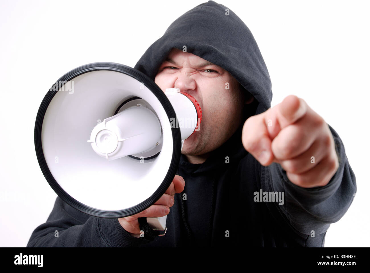a man using a megaphone Stock Photo - Alamy