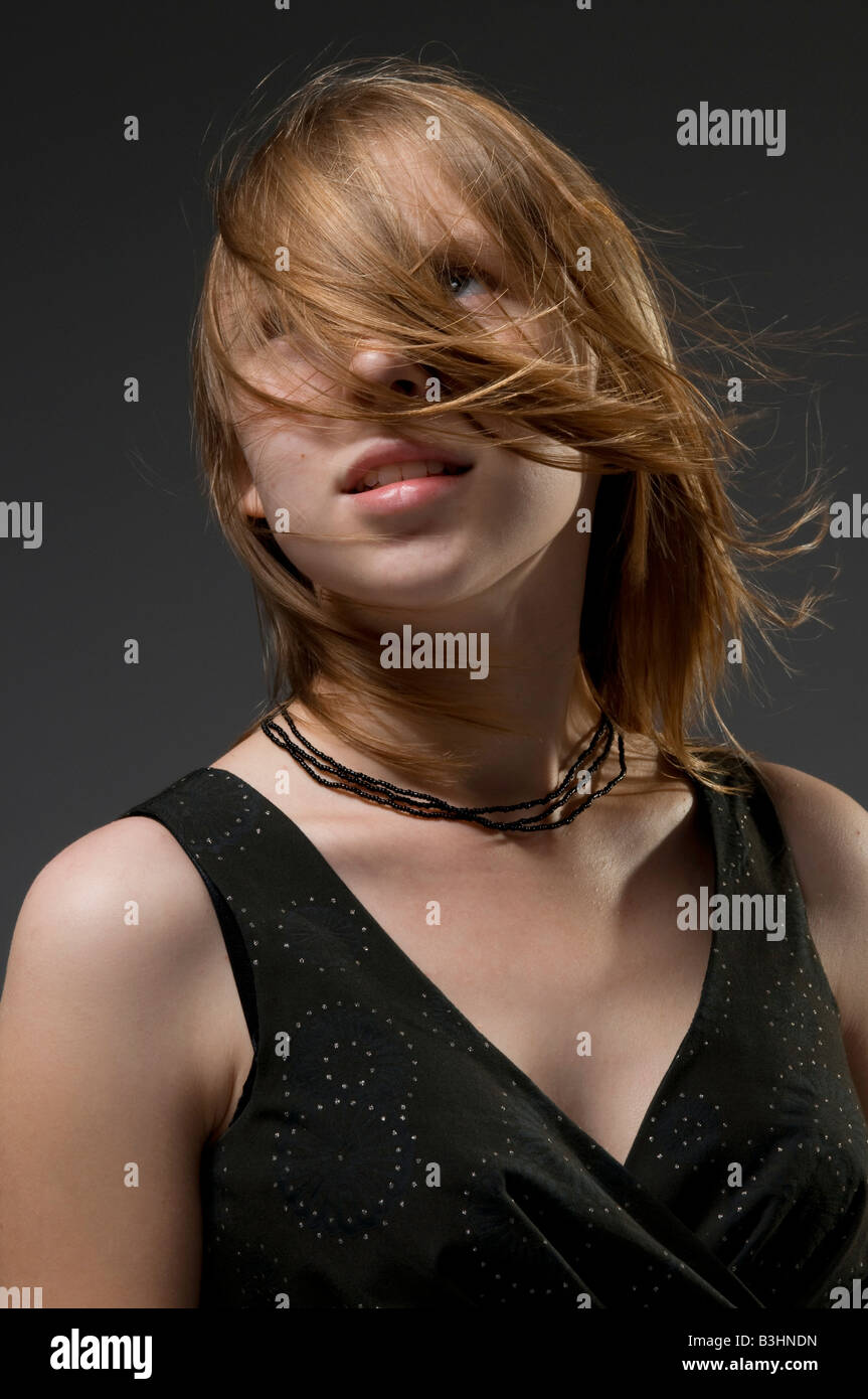 Young girl in black dress portrait Stock Photo - Alamy