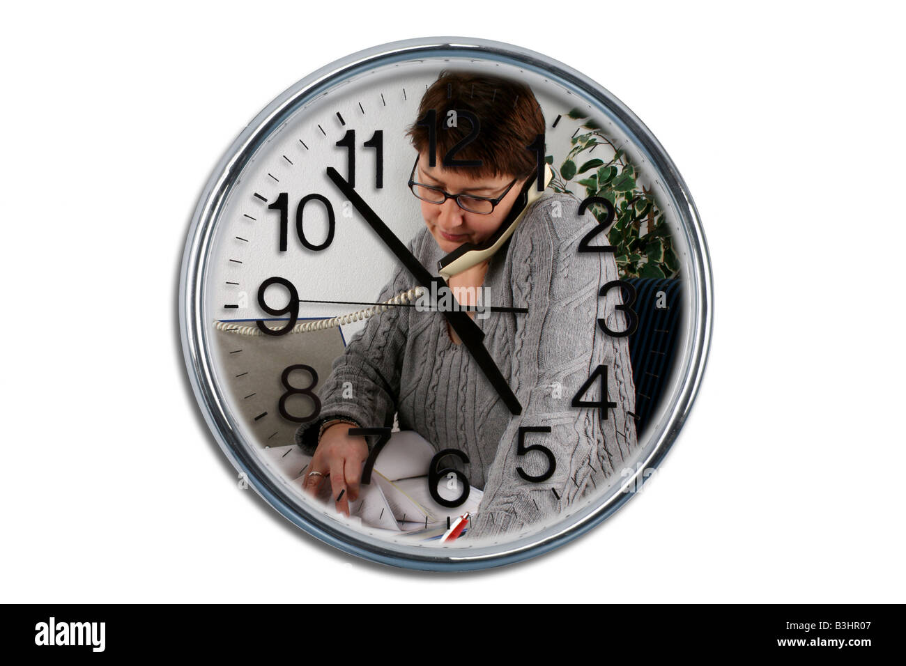 office work and a clock Stock Photo Alamy