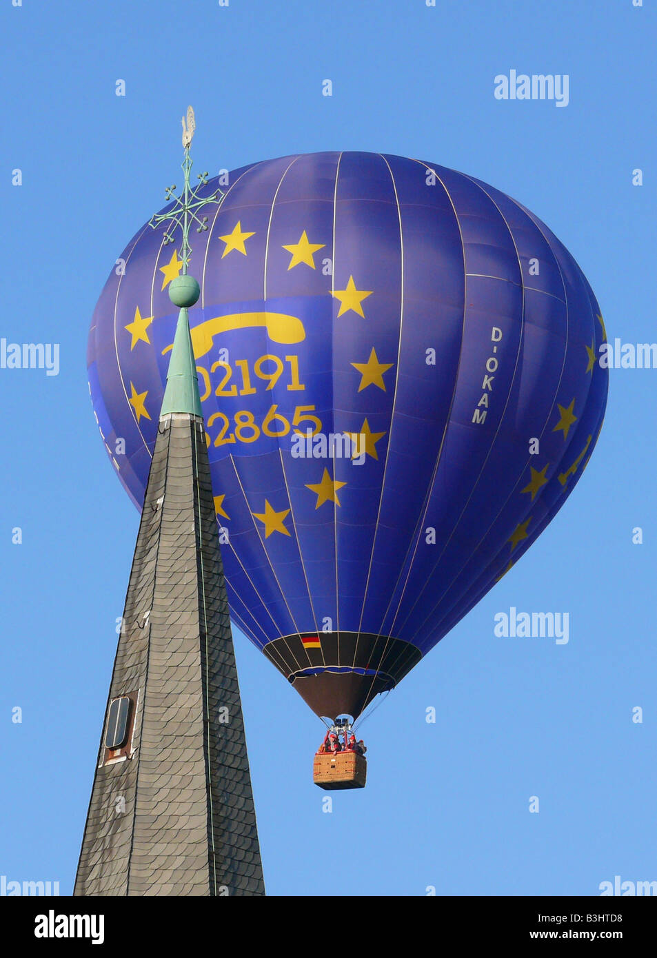 hot-air balloon and steeple Stock Photo