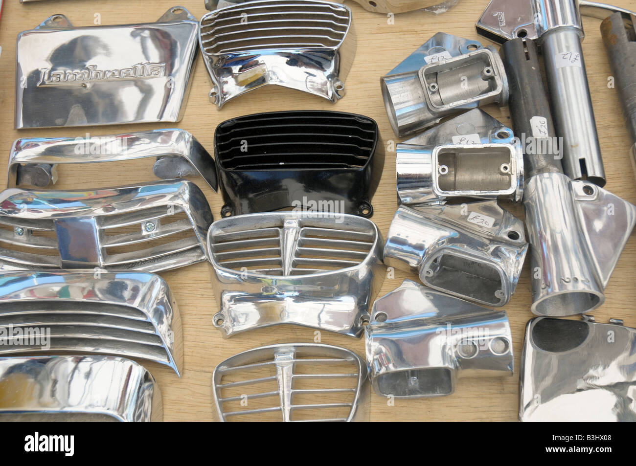 chromed scooter parts for sale on a stall Stock Photo Alamy