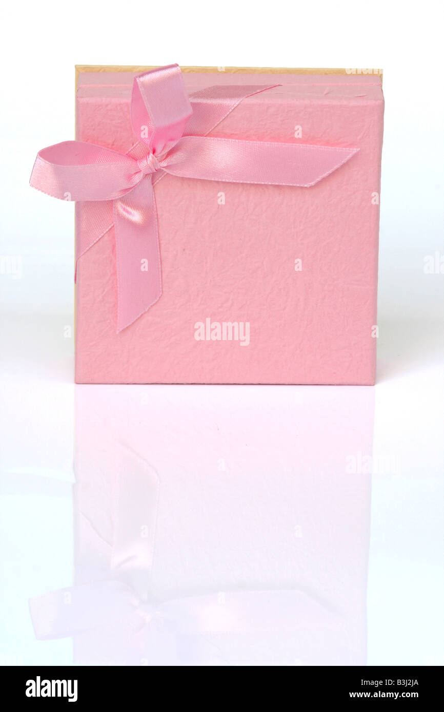 pink gift box with bow isolated on white background with reflection ...