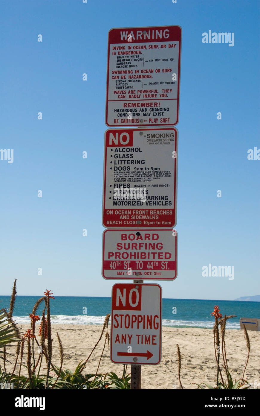 balboa peninsula beach warning sign close up newport beach orange county, california ca usa three miles 5 km long, california Stock Photo