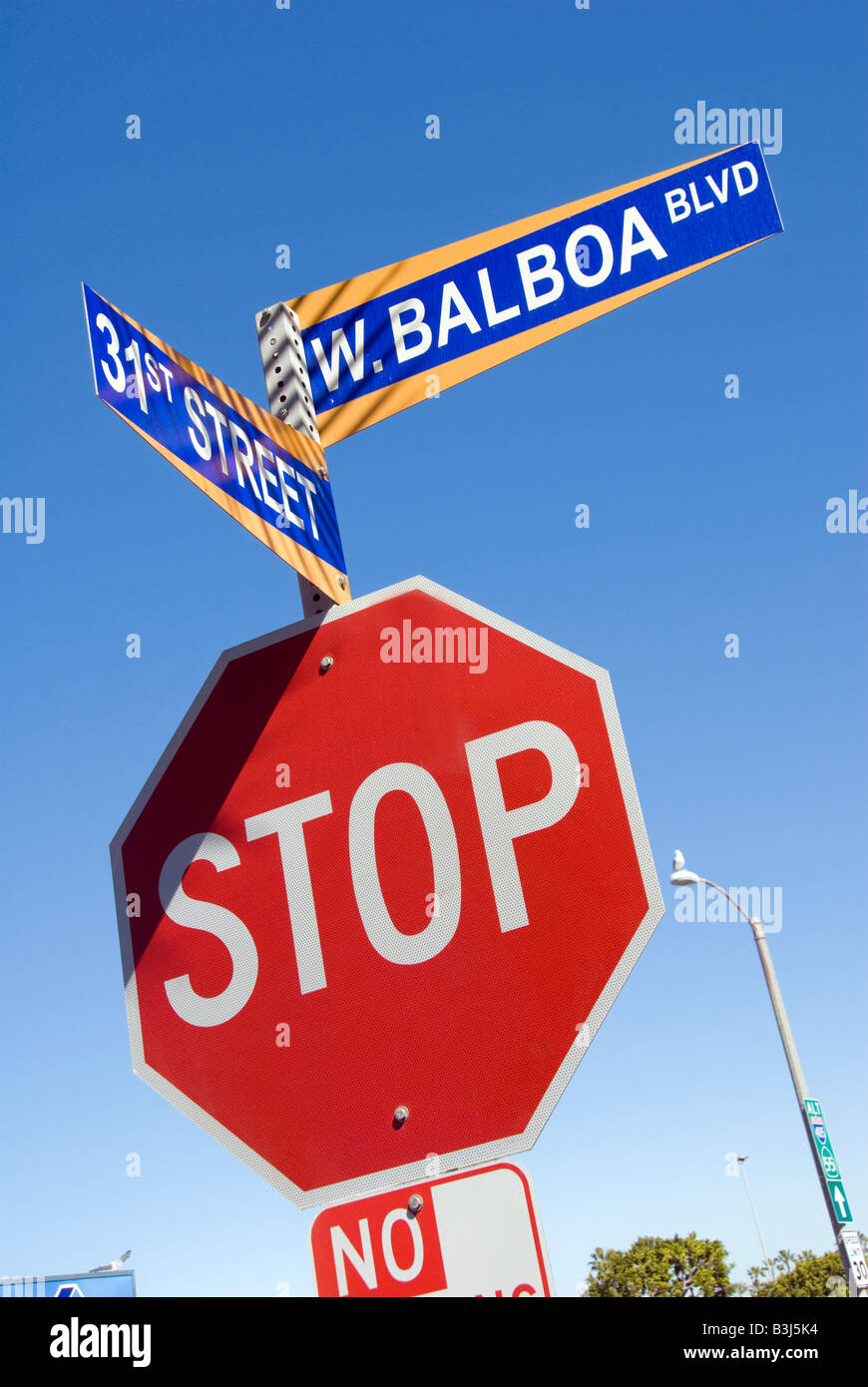 balboa peninsula stop sign close up newport beach, orange county, california, ca usa three miles 5 km long, california Stock Photo