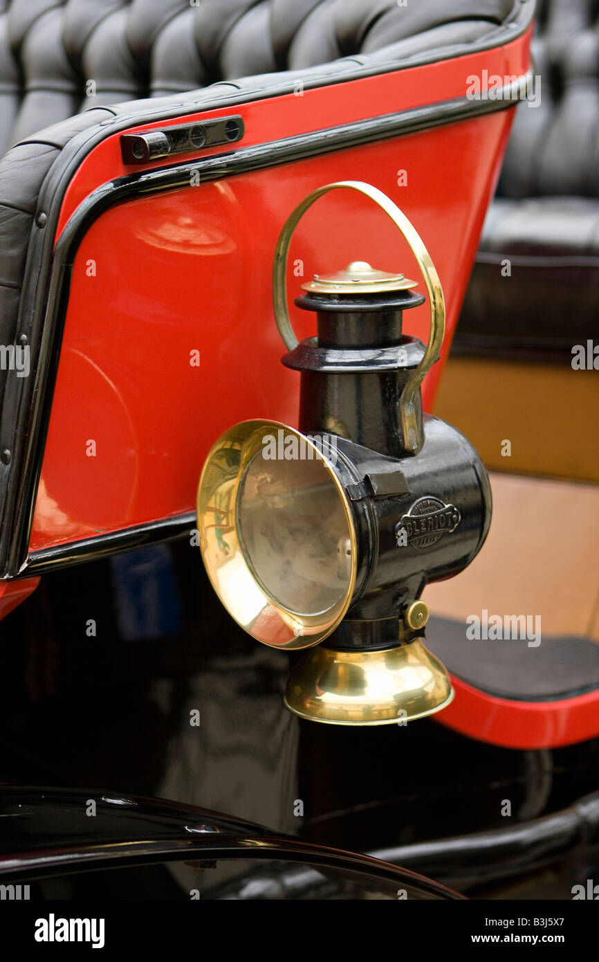Carriage lamp from a red 1898 Peugeot vintage car Stock Photo