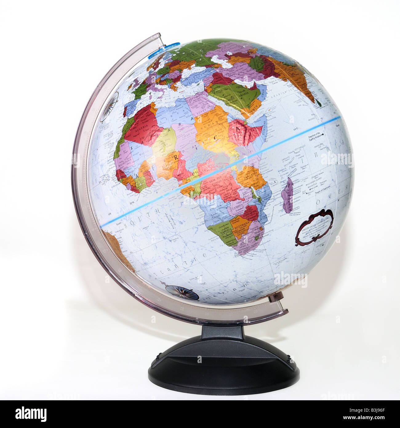 A world globe on a stand showing continents. Stock Photo