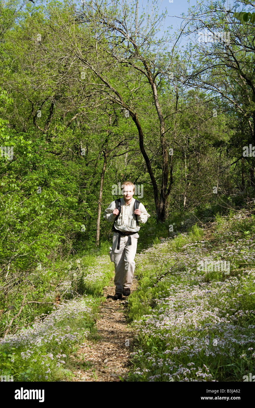Male hiker in the Ozark Mountains region of Arkansas behind the Tyler Bend Visitors Center on the Buffalo National River Stock Photo