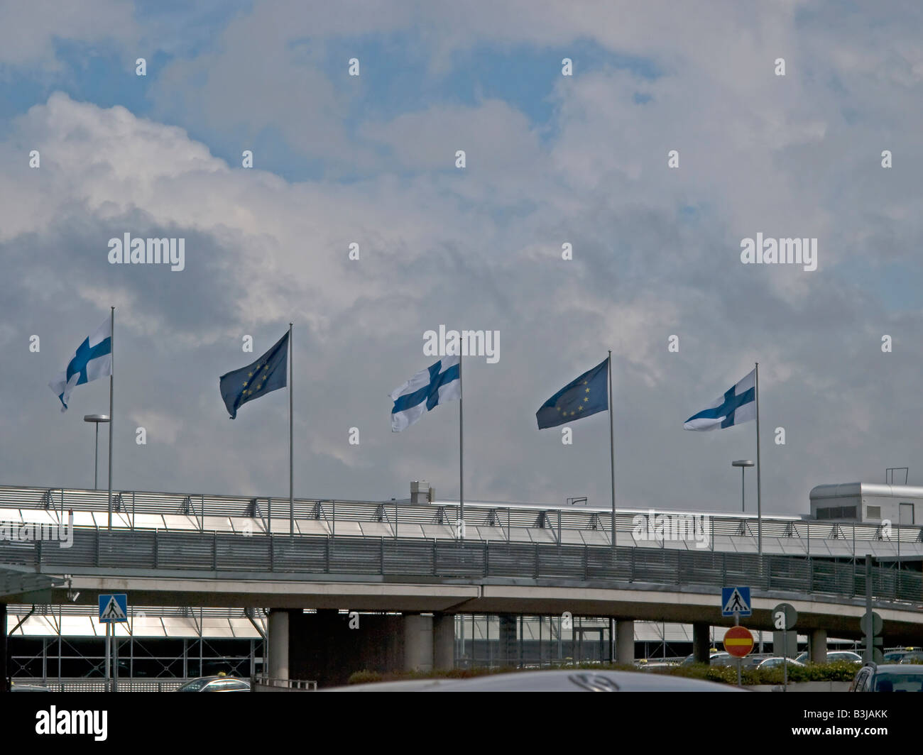 flags of Finland and Europe at the international terminal of the Helsinki Vantaa airport in Helsinki Finland Stock Photo