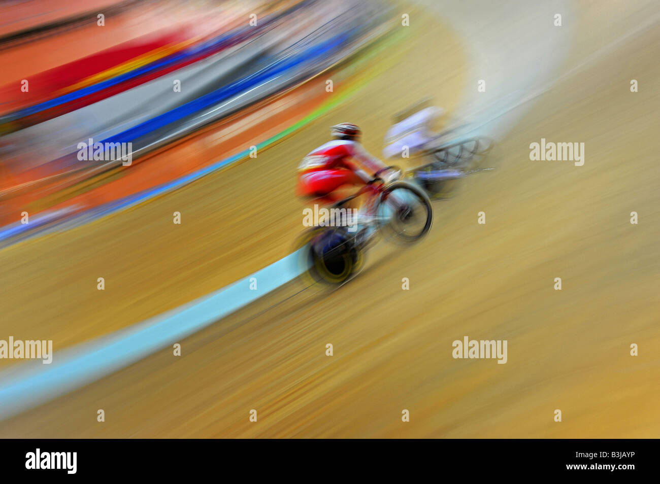 Riders compete in men individual pursuit cycling track race at the 2008 Beijing Olympics Stock Photo